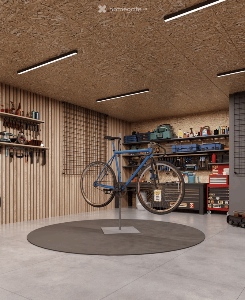 A modern garage with wooden paneling, a suspended bicycle on a stand, shelves with tools and storage boxes, and a polished concrete floor.