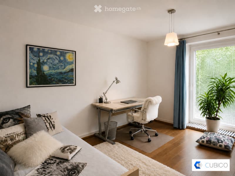 A modern, cozy room with a sofa, desk, chair, laptop, lamp, potted plant, and decorative pillows. The room features a large window with blinds and a hanging light fixture.