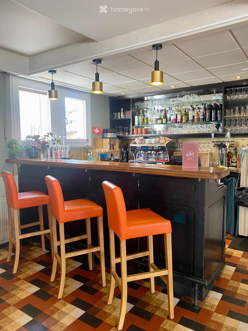 {"type": "Furnished Room", "objects": ["bar counter", "stool", "coffee machine", "cupboard", "bottle", "cup", "faucet", "faucet", "faucet", "faucet", "faucet", "faucet", "faucet", "faucet", "faucet", "faucet", "faucet", "faucet", "faucet", "faucet", "fauc
