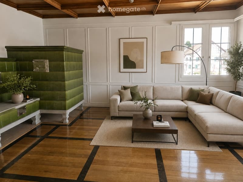 Modern living room with a large sectional sofa, coffee table, floor lamp, fireplace, and decorative plants.