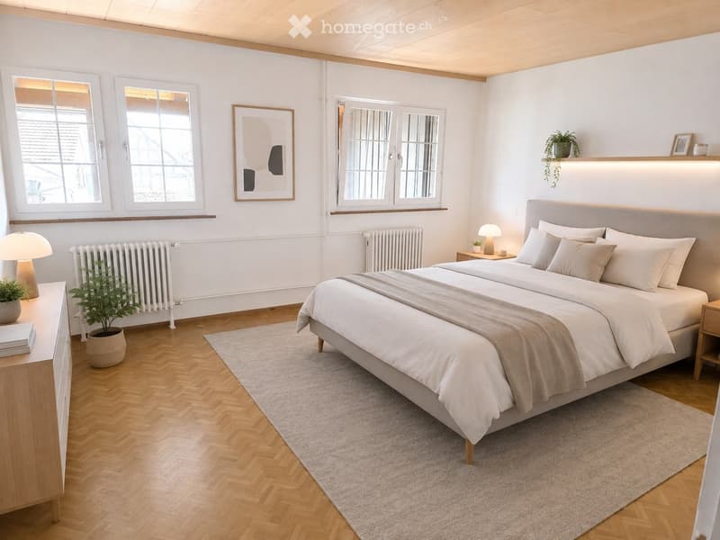 Modern bedroom with a large bed, nightstands, lamps, potted plants, and a picture frame on the wall. The room features wooden flooring and large windows.