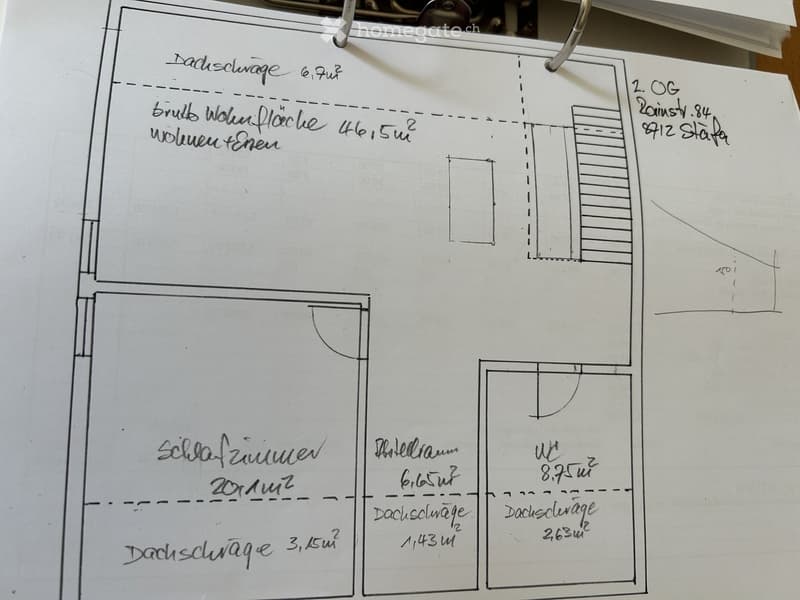 Hand-drawn floor plan showing a two-story building with labeled areas including a living room, bedroom, and attic spaces.