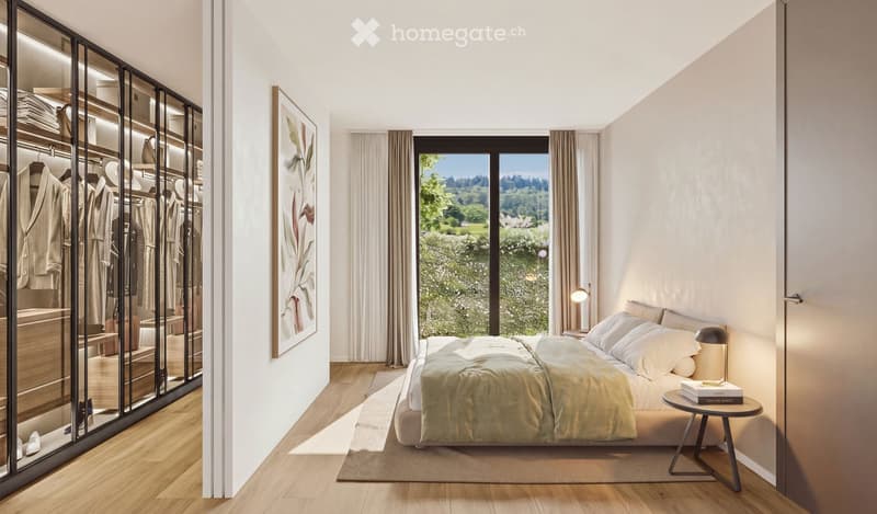 Modern bedroom with a large bed, nightstand, side table, floor lamp, artwork, and a walk-in closet with clothing racks.