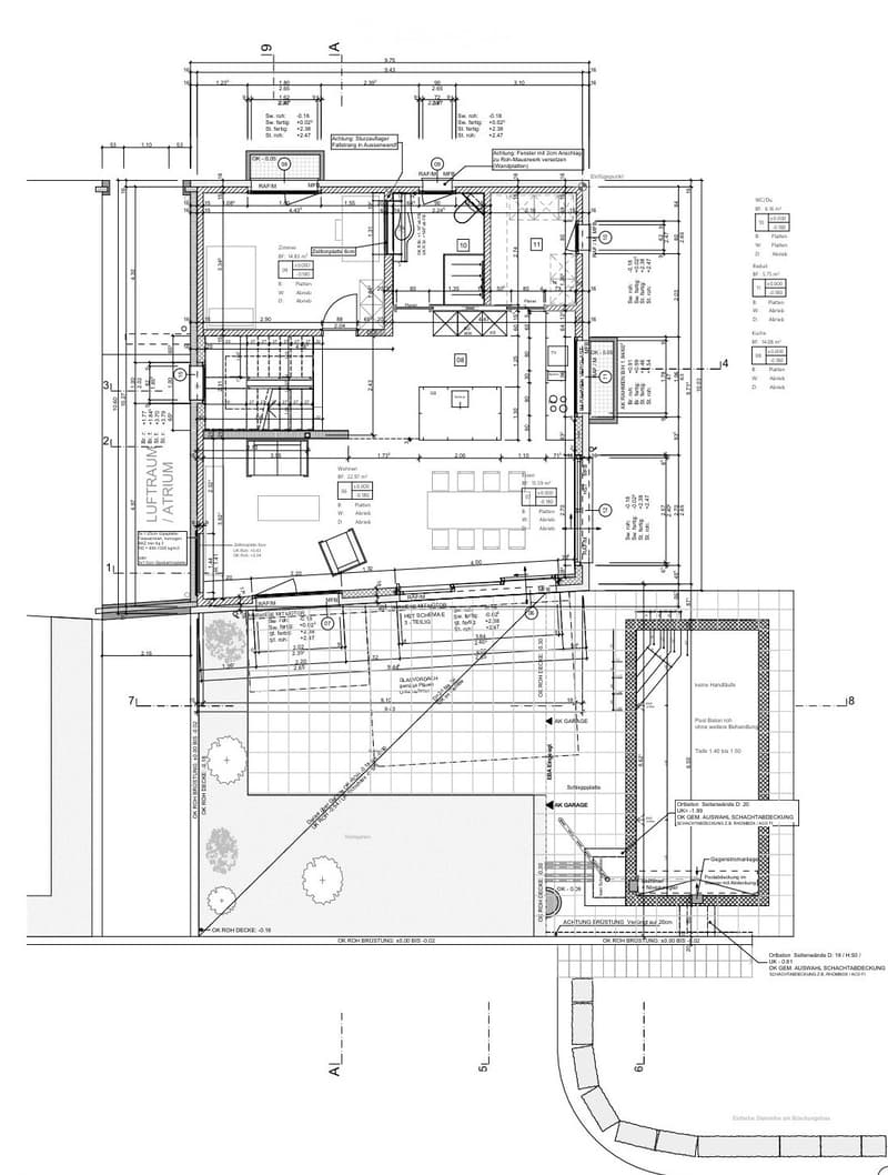 Floor plan of a multi-story building showing various rooms, including living areas, bedrooms, bathrooms, and a garage. Dimensions and labels are provided for each room and structural element.