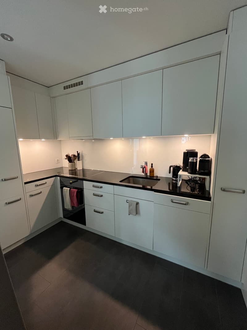 {"type": "Kitchen", "objects": ["oven", "sink", "coffee maker", "faucet", "oven mitts", "cupboard", "faucet", "oven", "cupboard", "cupboard", "cupboard", "cupboard", "cupboard", "cupboard", "cupboard", "cupboard", "cupboard", "cupboard", "cupboard", "cupb