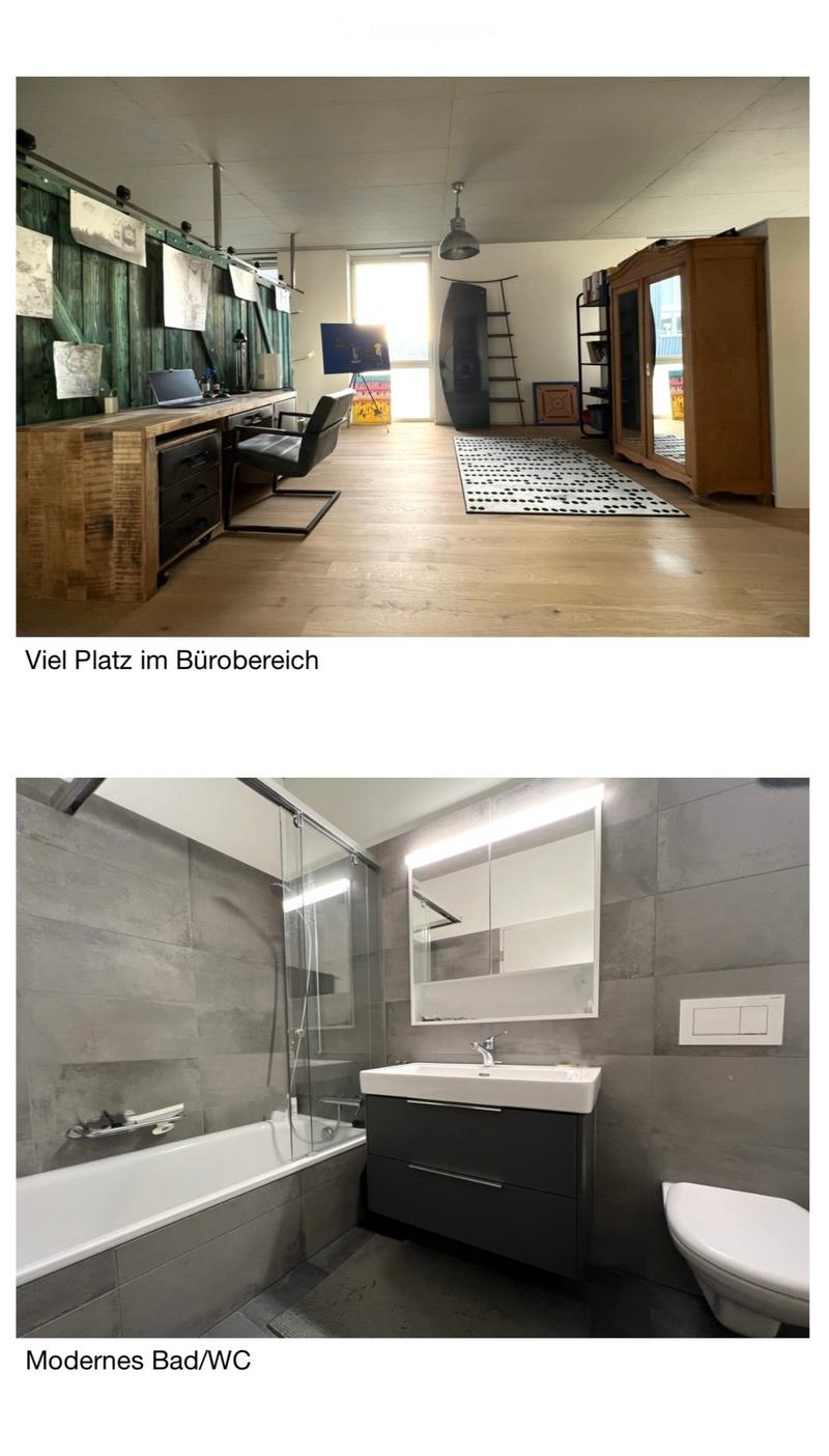 Modern bathroom with grey tiles, a bathtub, a sink with a modern faucet, a toilet, and a large mirror above the sink.