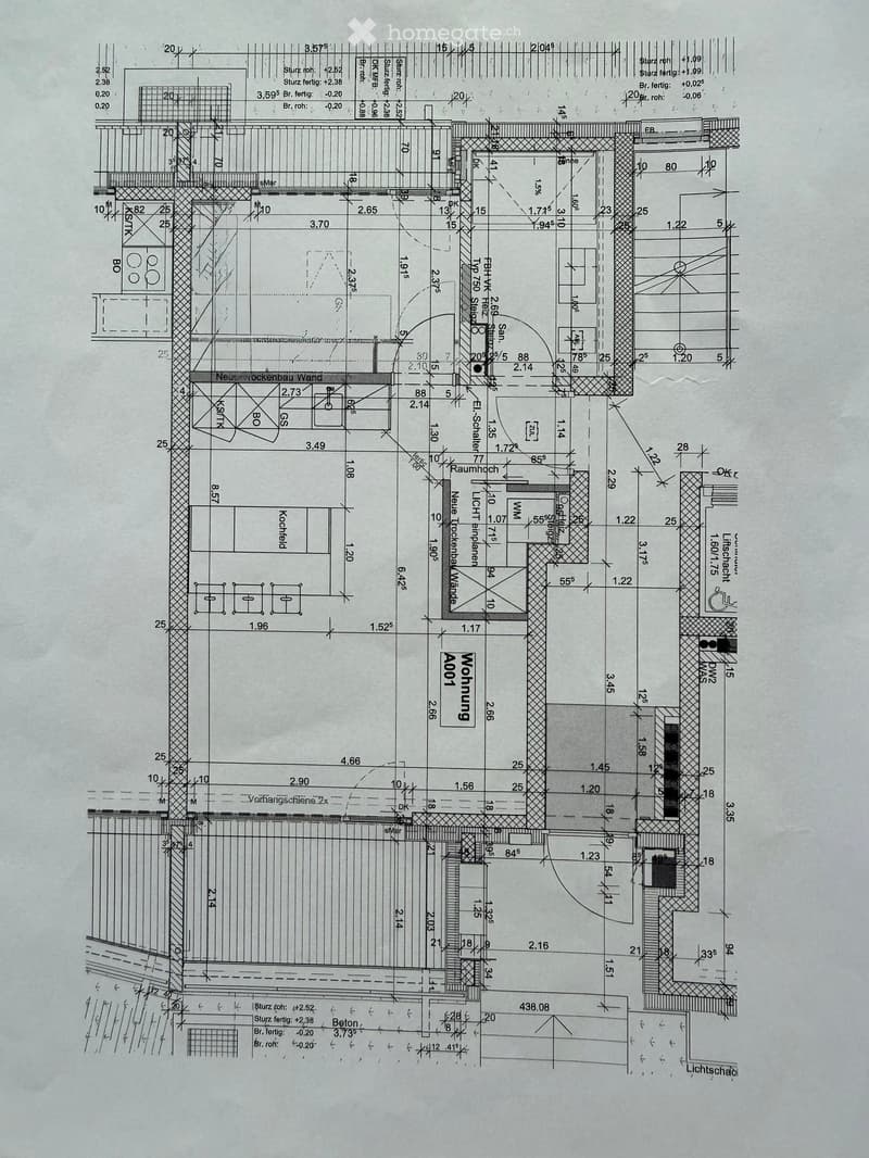 Floor plan of a residential building showing multiple rooms, including a kitchen, living room, bedrooms, and bathrooms, with detailed measurements and structural elements.