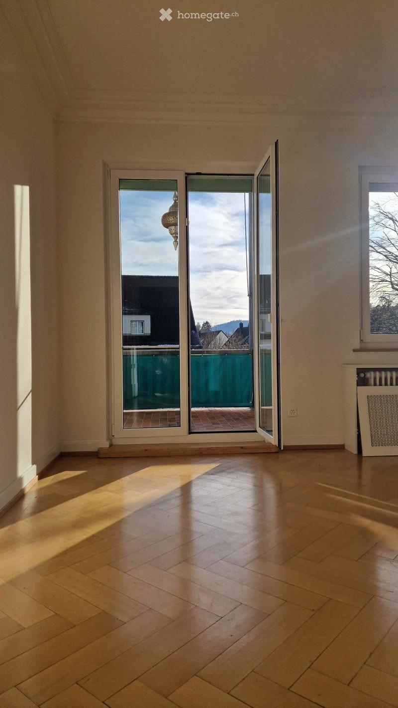 empty room, wooden floor, large windows, balcony, view of the outside
