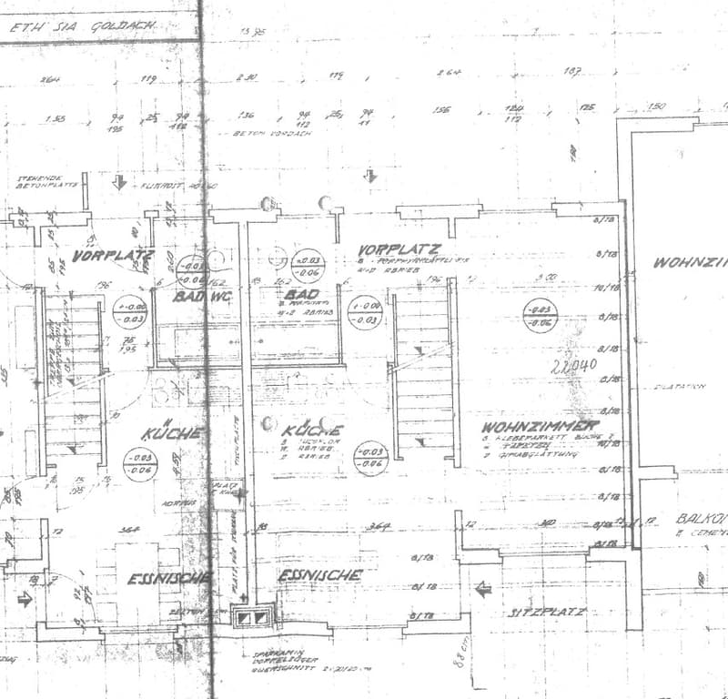 Floor plan showing a multi-room layout including a kitchen, living room, bedroom, bathroom, and balcony.
