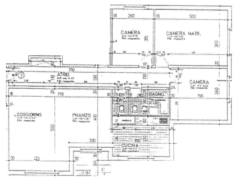 Floor plan showing multiple rooms including living room, kitchen, bedroom, and bathrooms with labeled dimensions and room names.