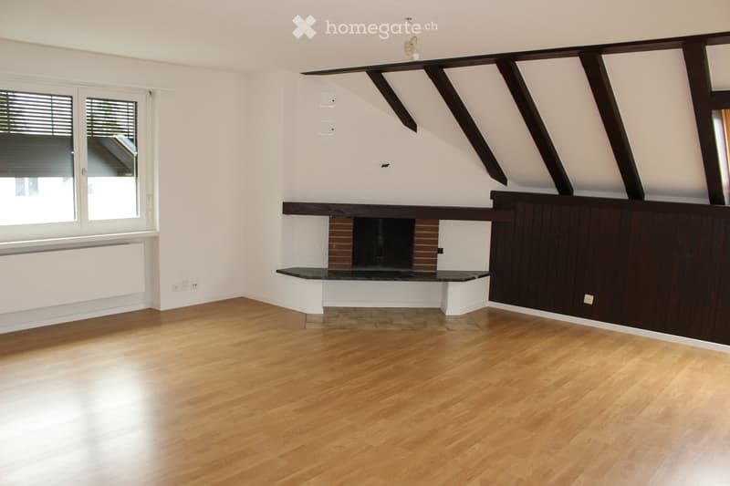 wooden floor, empty room, brick fireplace, white walls, radiator, window with blinds
