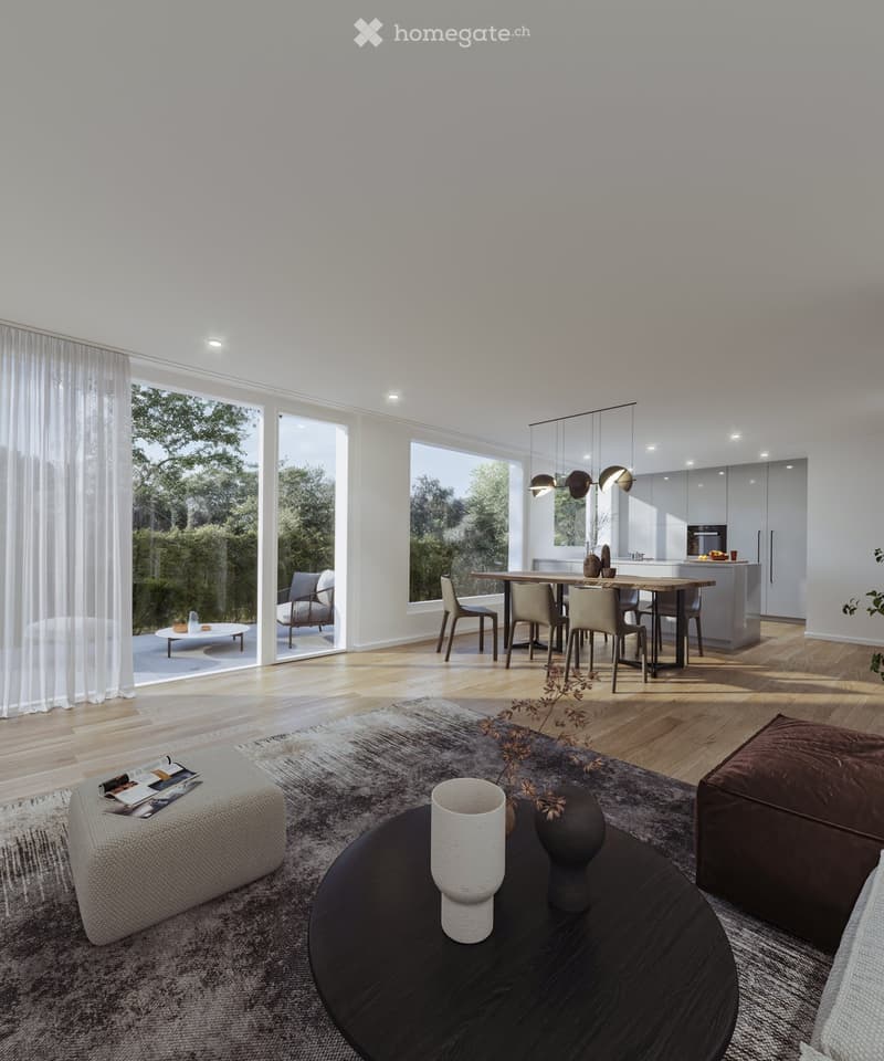 Modern living and dining area with large windows, wooden flooring, a sofa, coffee table, dining table with chairs, and a kitchen island.