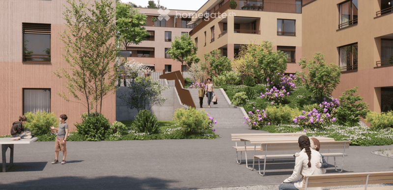 Courtyard area with modern buildings, greenery, benches, and people walking and sitting.