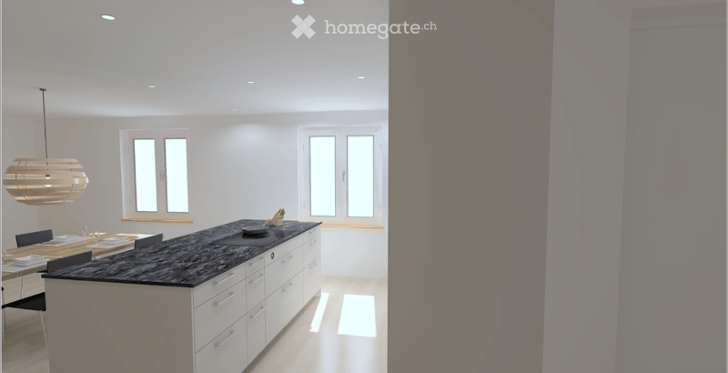 Modern kitchen with white cabinets, black countertop, island, dining area, pendant light, and multiple windows.