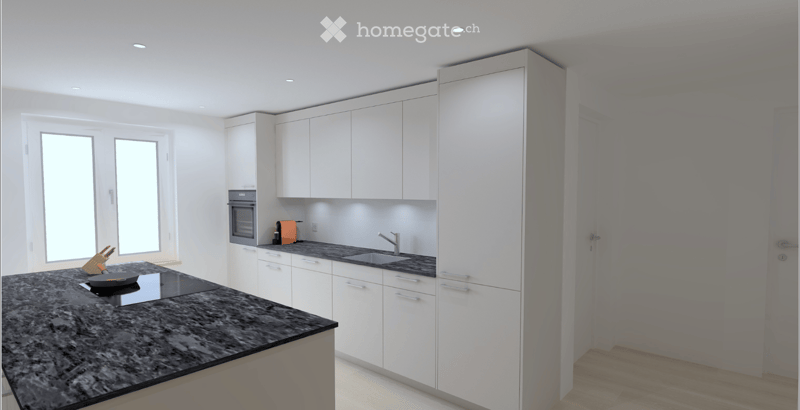 Modern kitchen with white cabinets, granite countertop, built-in oven, sink, and small appliances.