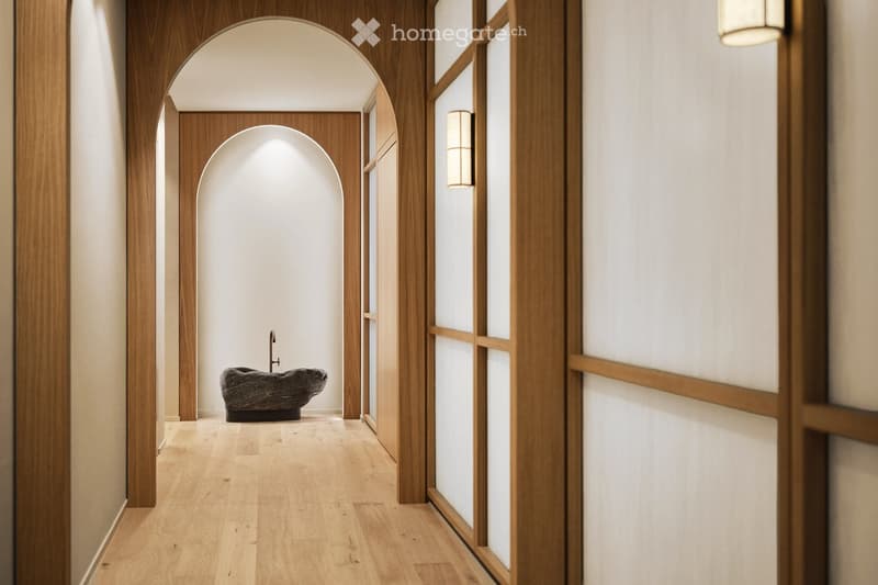 wooden walls, wooden floor, arched entrance, stone bathtub, wall-mounted faucet, wall-mounted lights