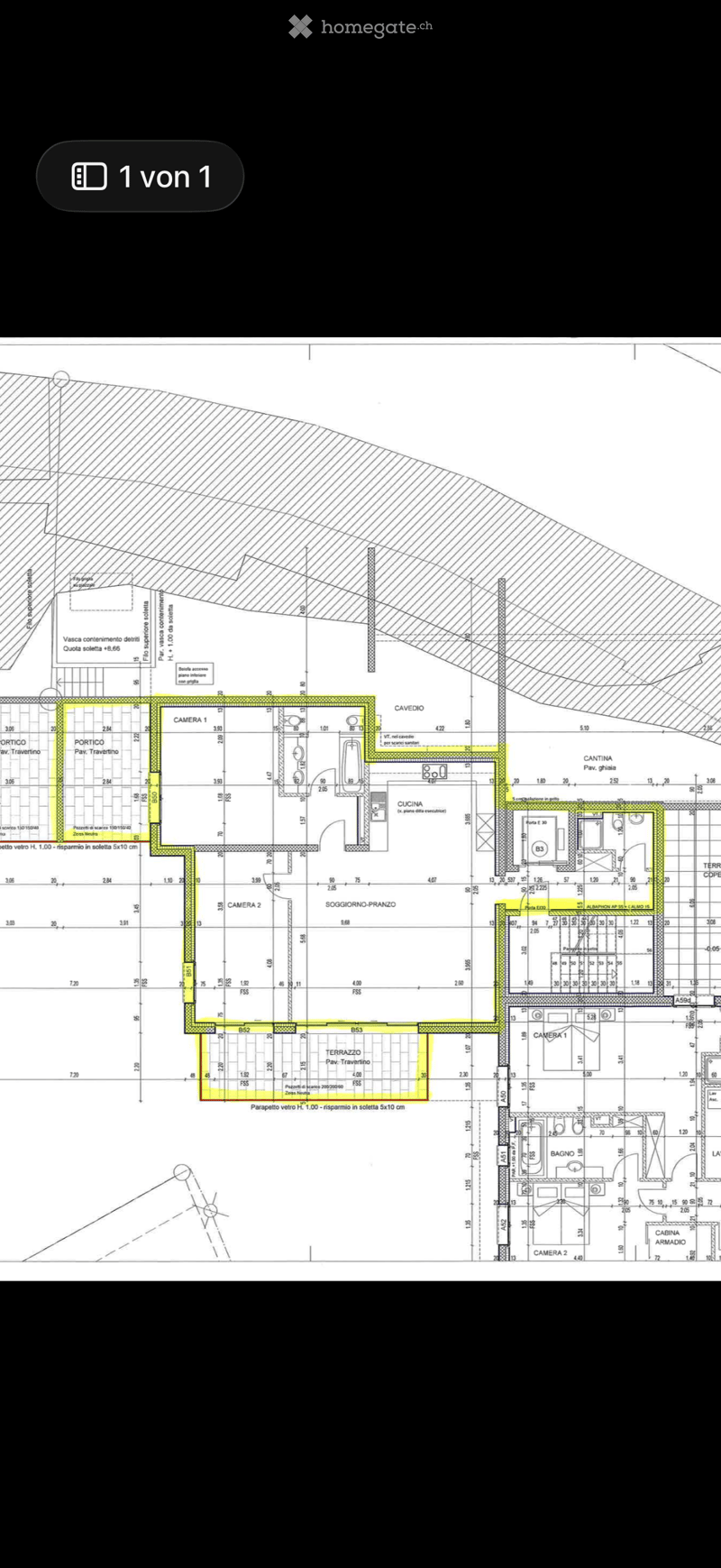 Floor plan of a residential building showing multiple rooms including living spaces, bedrooms, kitchen, bathroom, and outdoor areas.