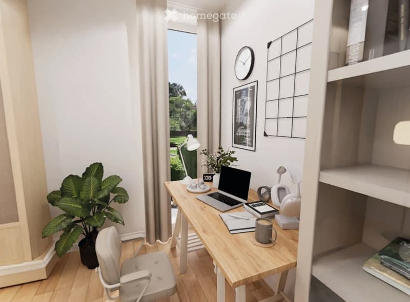 Minimalistic office with desk, chair, books, laptop, and plant