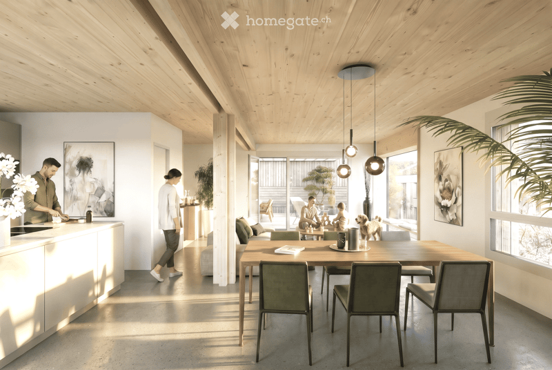 Open-plan living and dining area with wooden ceiling, large windows, dining table with chairs, sofa, coffee table, kitchen counter, pendant lights, and artwork on walls.