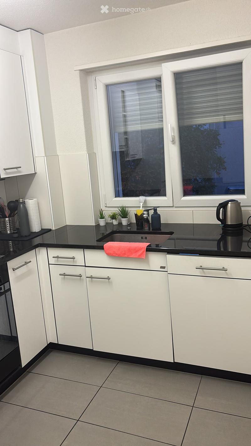 {"type": "Kitchen", "objects": ["sink", "faucet", "cupboard", "bottle", "towel", "cup", "pot", "fridge", "oven", "cupboard", "cupboard", "cupboard", "cupboard", "cupboard", "cupboard", "cupboard", "cupboard", "cupboard", "cupboard", "cupboard", "cupboard"
