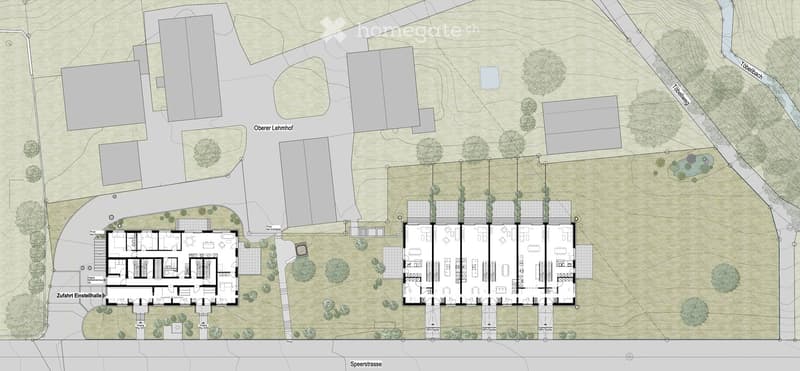 Floor plan of a residential complex with multiple buildings, parking areas, and landscaped spaces.