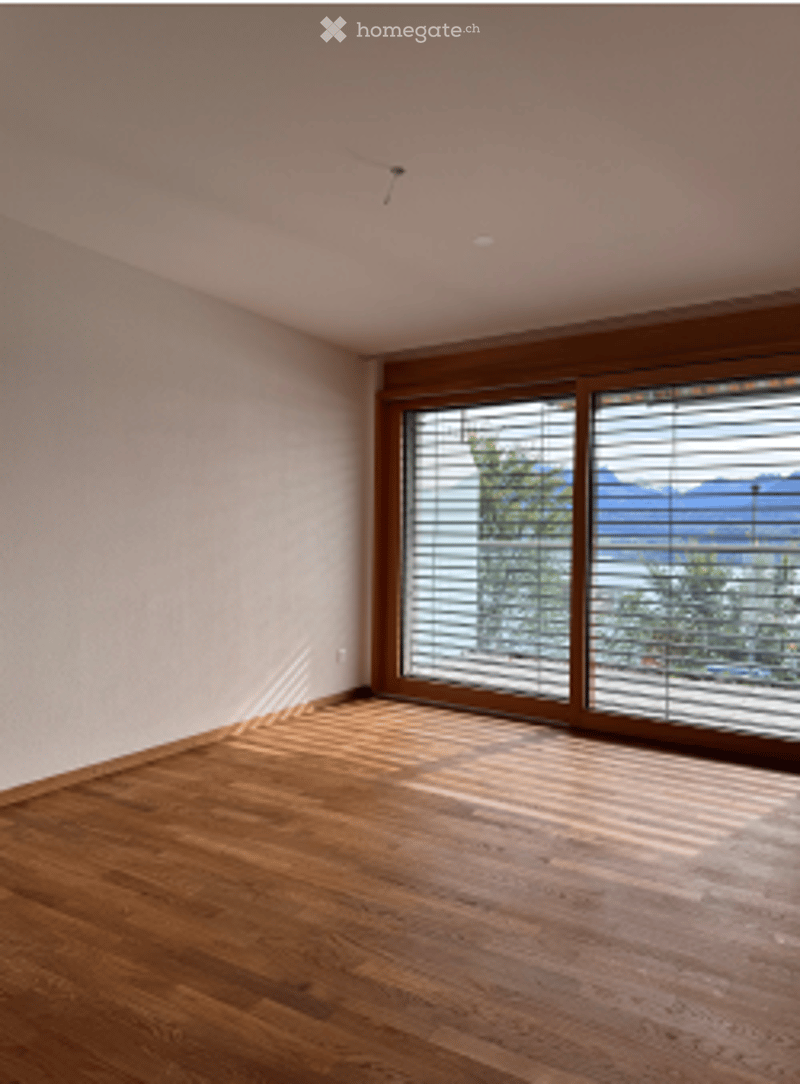 Unfurnished Room. Completely empty room with bare walls and wooden floor. No furniture or equipment.