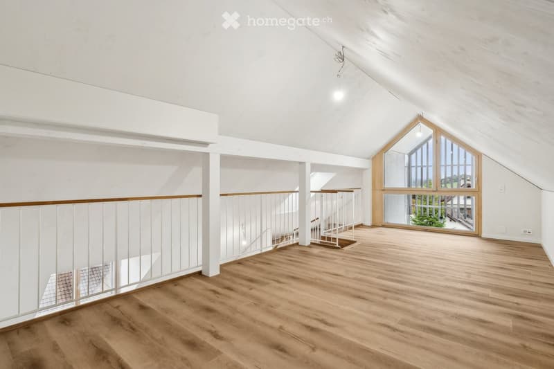 empty room, wooden flooring, white walls, white railings, stairs, glass window, window on roof