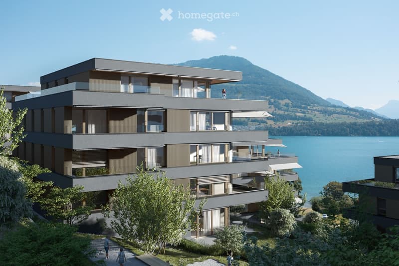apartment building with balconies, multiple floors, modern architecture, scenic lake view, adjacent mountains