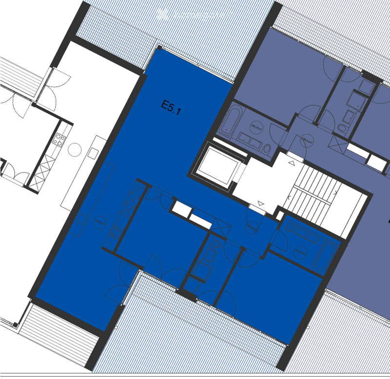 Floor plan showing a layout with multiple rooms including a large open space, several smaller rooms, and a balcony area.