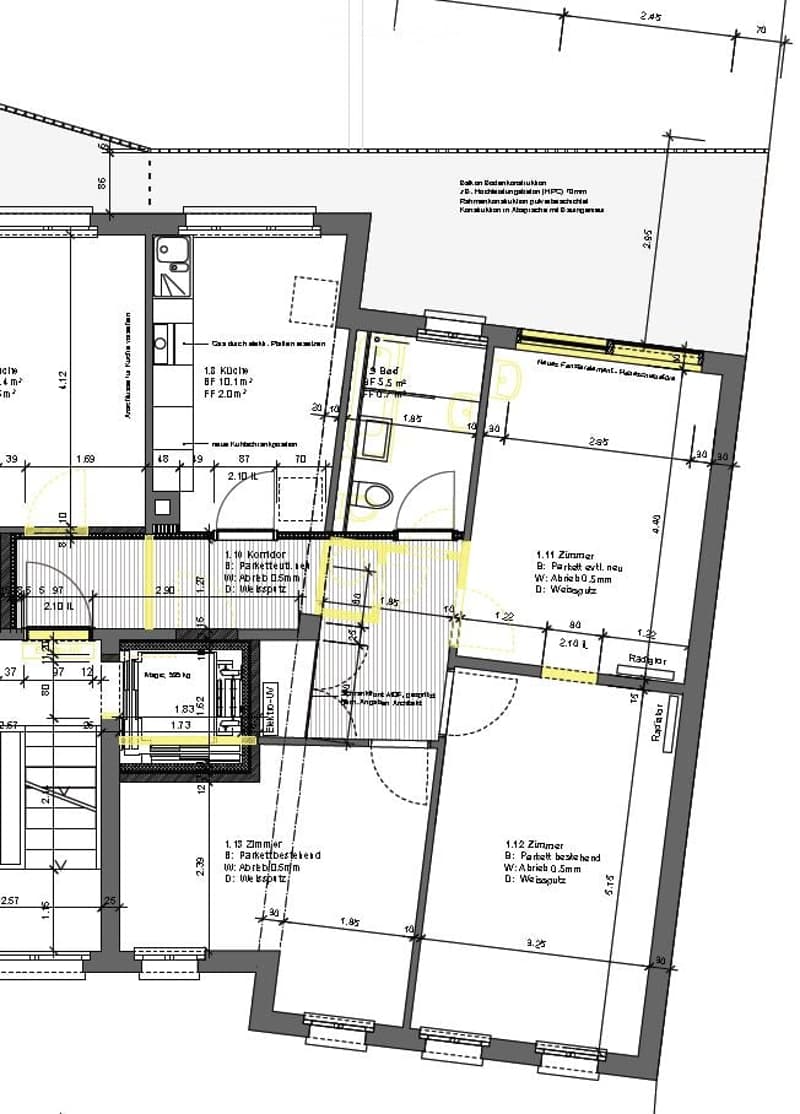 Floor plan of a residential building showing multiple rooms including bedrooms, a kitchen, a bathroom, and a living area. Dimensions and room labels are provided.