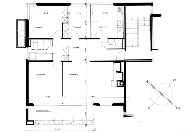 Floor plan of a residential unit with labeled rooms including two bedrooms, a kitchen, a living area, a hallway, a bathroom, and a balcony.