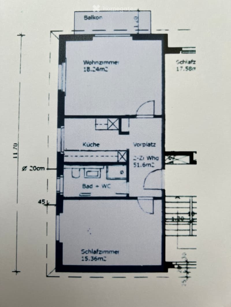 Floor plan showing a living room, kitchen, bedroom, bathroom, and balcony.