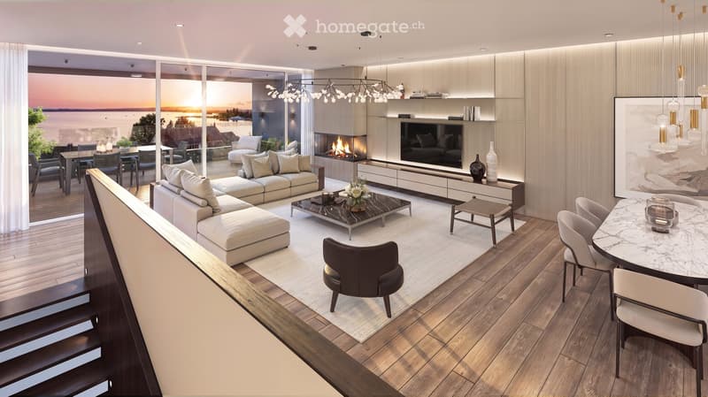 Modern living room with a view, featuring a sectional sofa, coffee table, fireplace, TV, dining area, and large windows overlooking the water.