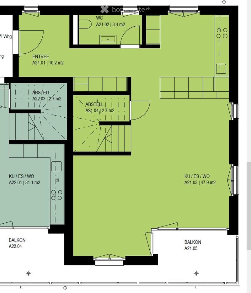 Floor plan showing a layout with an entrance, WC, kitchen/dining/living area, two balconies, and storage areas.