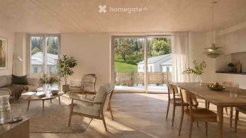 Open-plan living and dining area with light wood flooring, large windows, and a view of a green landscape. Features a sofa, coffee table, armchairs, dining table with chairs, pendant light, and decorative plants.