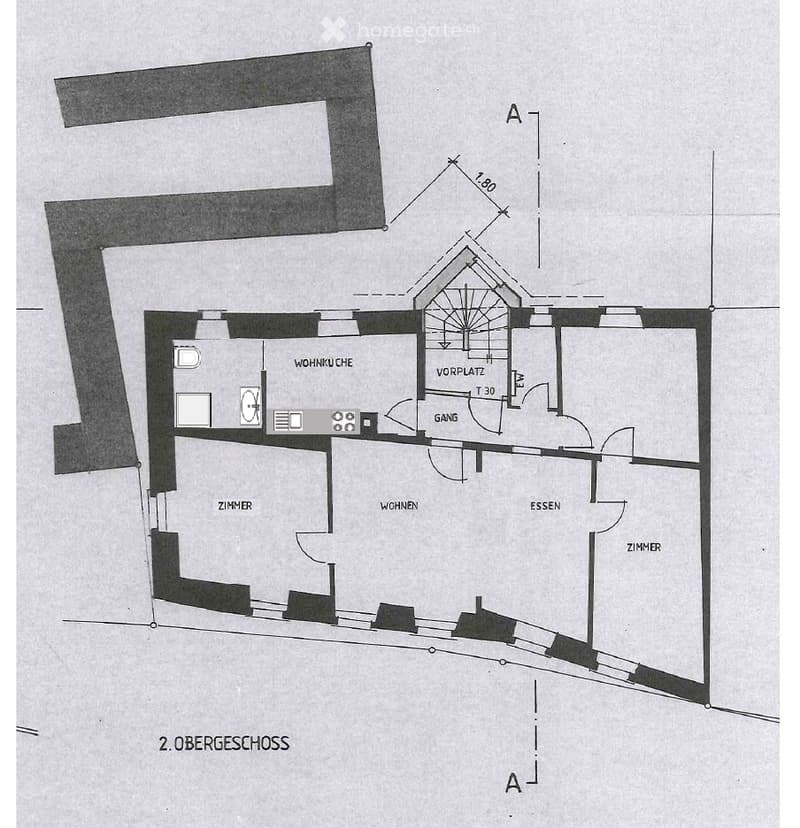 Floor plan of the second upper floor showing a kitchen, living area, dining area, hallway, and two bedrooms.