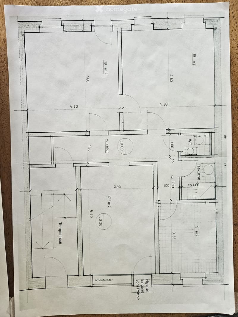 Floor plan of a residential unit showing a living area, kitchen, bedroom, bathroom, and hallway with labeled dimensions.