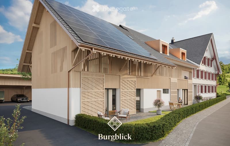 Modern two-story house with solar panels on the roof, a garage, and a well-maintained garden area with outdoor seating.