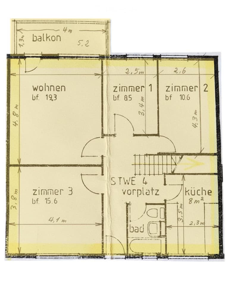 Floor plan showing a living area, three bedrooms, a kitchen, a bathroom, and a balcony.