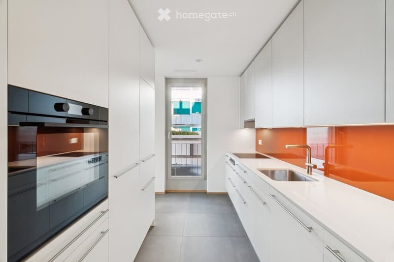 modern kitchen, white cabinets, stainless steel appliances, granite countertops, grey tiles, sink with faucet, dishwasher, window