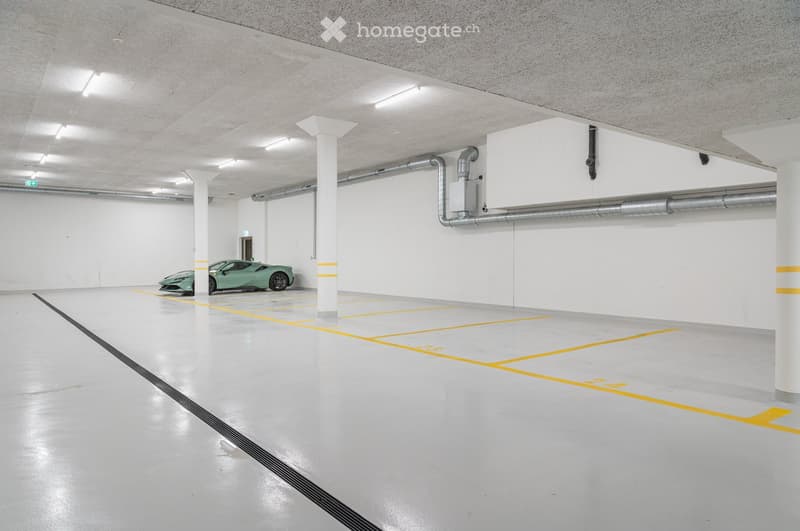 {"type": "Garage", "objects": [], "description": "Modern underground parking garage with white walls, concrete pillars, and a single green sports car parked in one of the designated spots.", "localized_descriptions": {"EN": "Modern underground parking gar