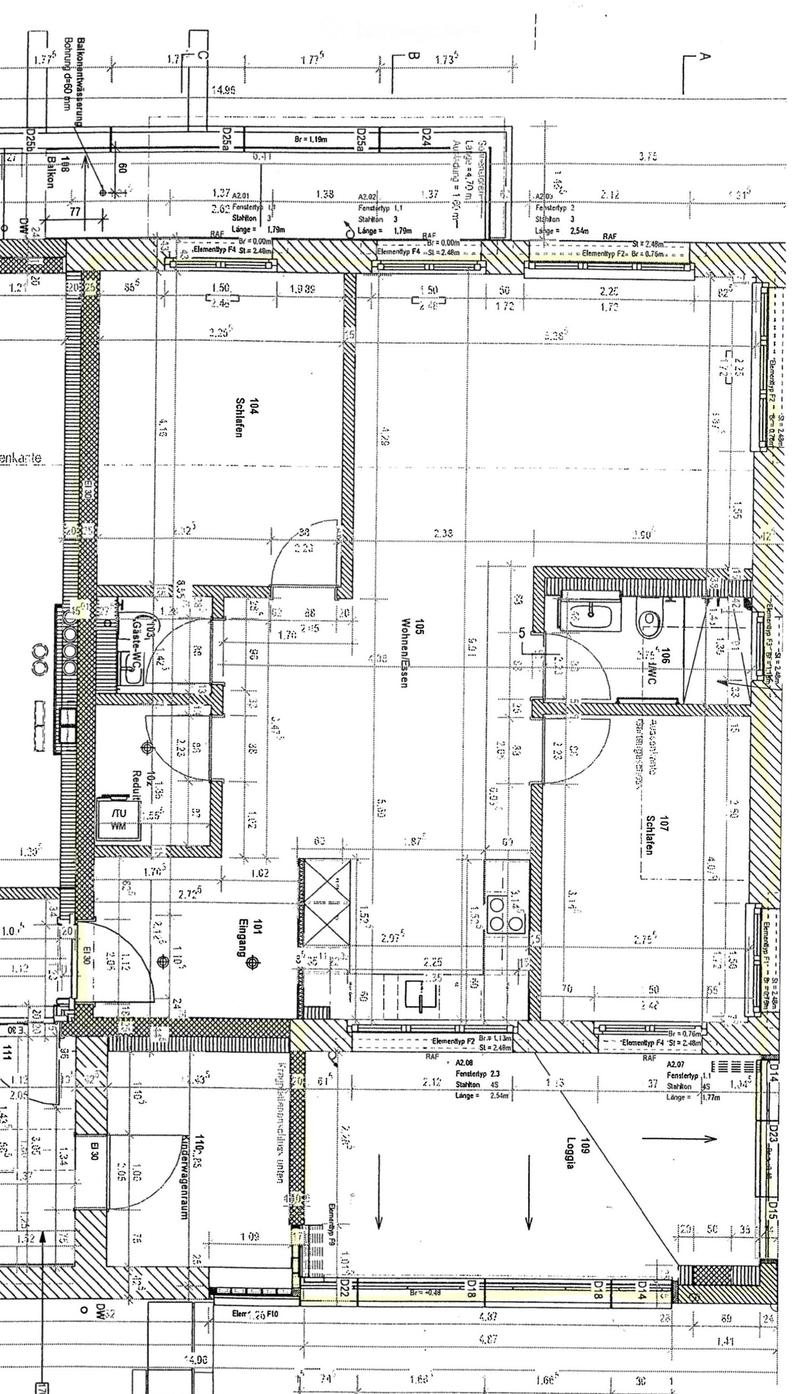Floor plan of a residential building showing multiple rooms, including a kitchen, living room, bedrooms, bathrooms, and a hallway.