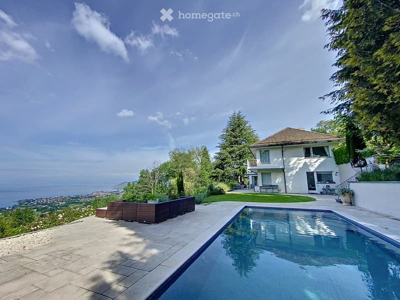 large villa, elevated position, swimming pool, sea view, garden, white exterior, balcony, brown roof
