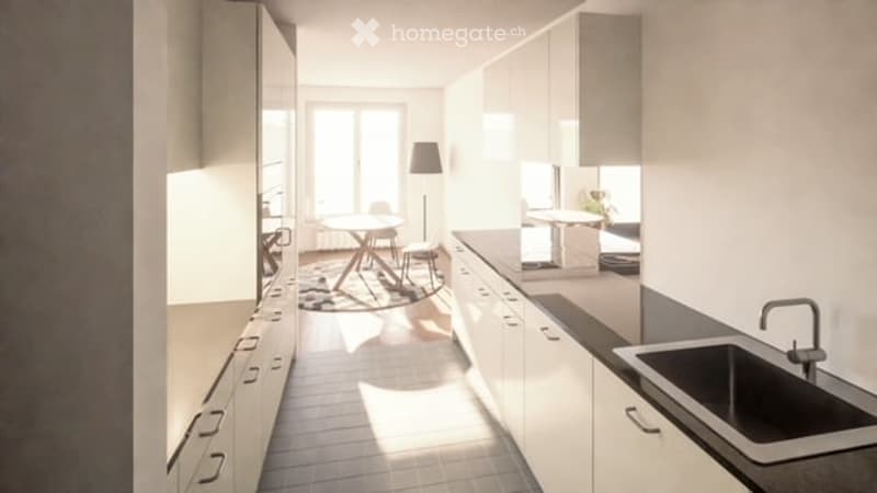 Modern kitchen with white cabinets, a sink, a faucet, a small dining area with a table and chairs, and a floor lamp.
