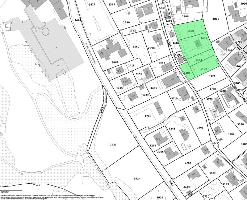 A detailed map showing a residential area with numerous buildings and plots, labeled with numbers and surrounded by streets and pathways.
