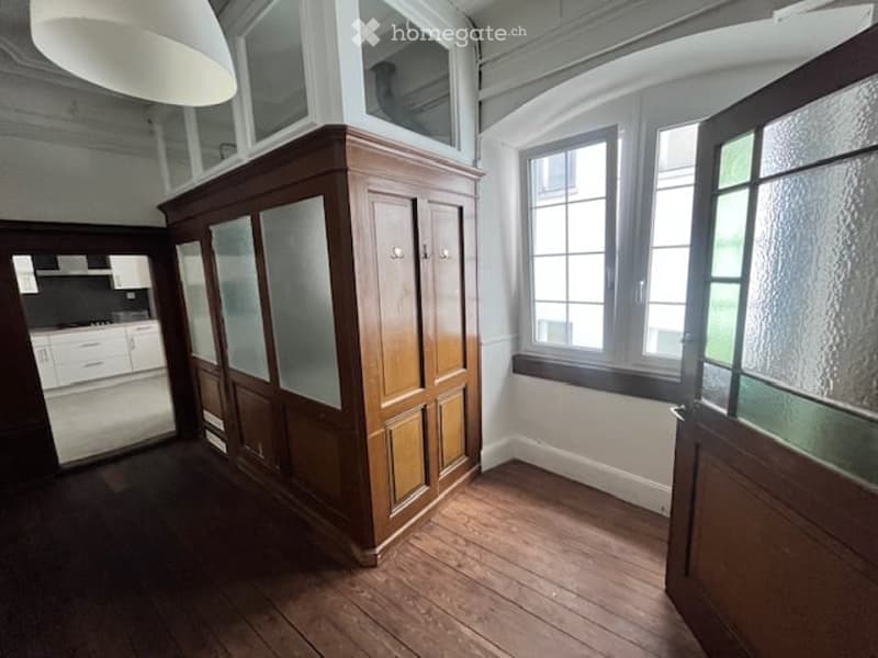 empty room, wooden floor, wooden built-in wardrobe, windows, large room