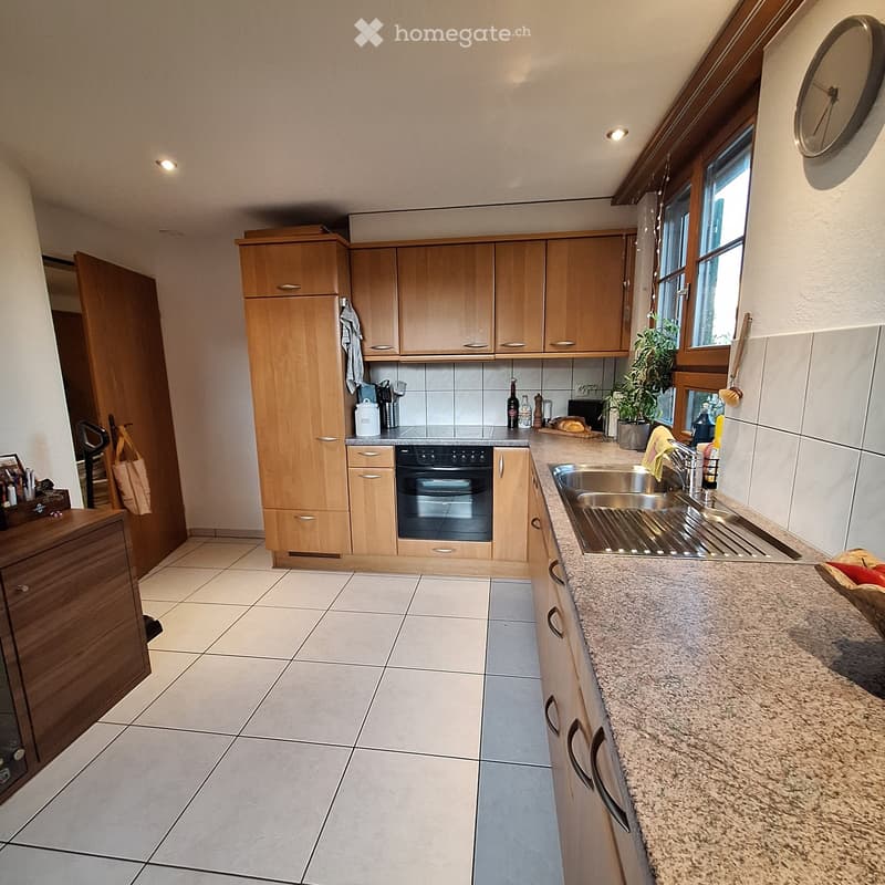 {"type": "Kitchen", "objects": ["cabinets", "oven", "sink", "faucet", "countertop", "bottle", "oven mitt", "oven cleaner", "oven cleaner", "oven cleaner", "oven cleaner", "oven cleaner", "oven cleaner", "oven cleaner", "oven cleaner", "oven cleaner", "ove