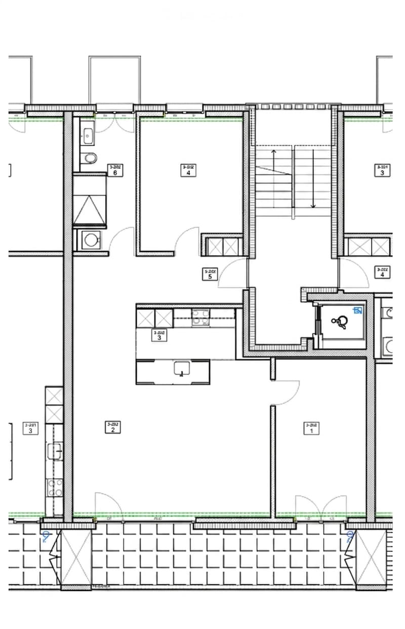 Floor plan showing a multi-level building with labeled rooms and spaces, including a parking area, living areas, and service spaces.