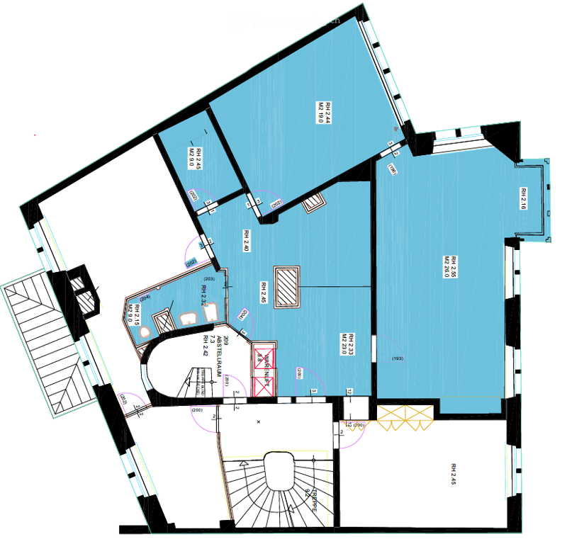 Floor plan of a residential building with multiple rooms including living room, kitchen, bedrooms, bathrooms, and a garage.