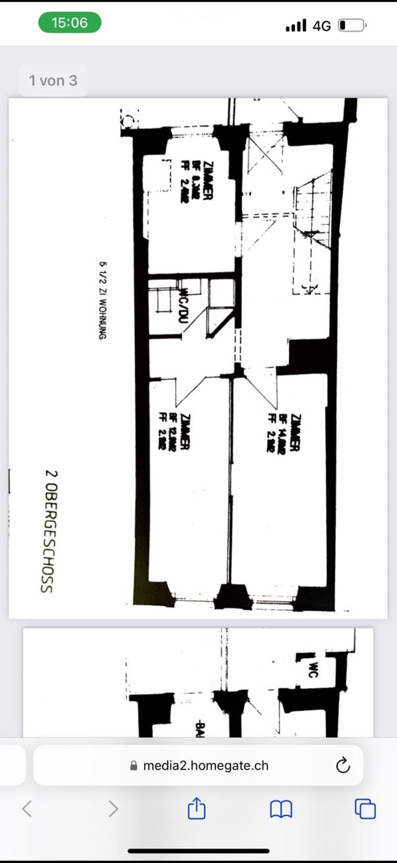 Floor plan of a two-story residential building showing living spaces, bedrooms, and bathrooms.